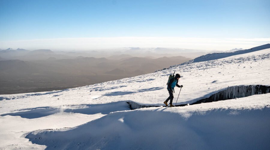_DSC4699 hiker hiking up a mountain with backpack and ice axe, winter, Iceland