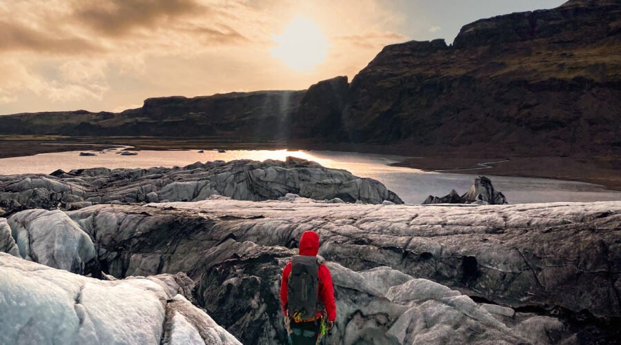 MidnightSun_Glacier_Edits person hiking on the glacier midnight sun